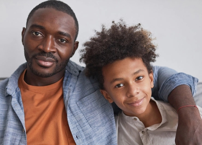 Father sitting with son